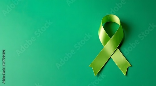 Green ribbon symbolizing mental health awareness