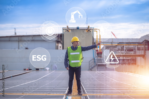 A solar energy engineer inspects photovoltaic panels using digital technology to drive a sustainable future with ESG standards.