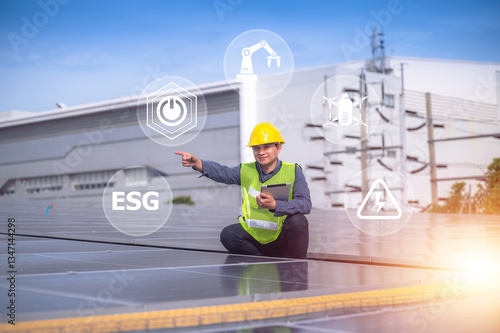 A solar energy engineer inspects photovoltaic panels using digital technology to drive a sustainable future with ESG standards.