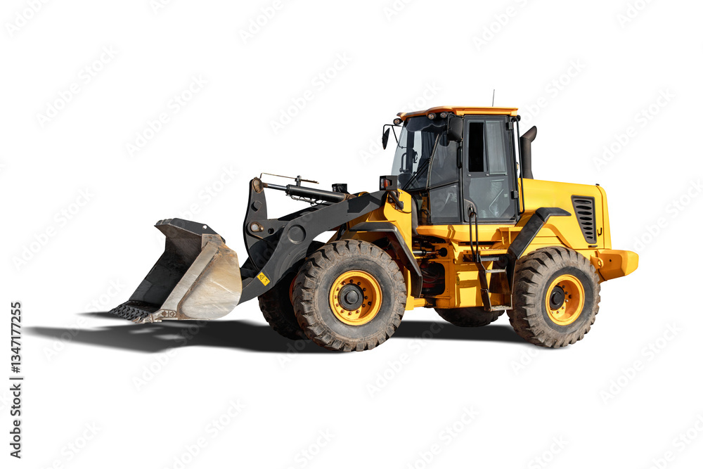 Naklejka premium Loader at construction site, its body shining under bright sun, ready for upcoming construction work. It is isolated on white background for design. Construction equipment rental.