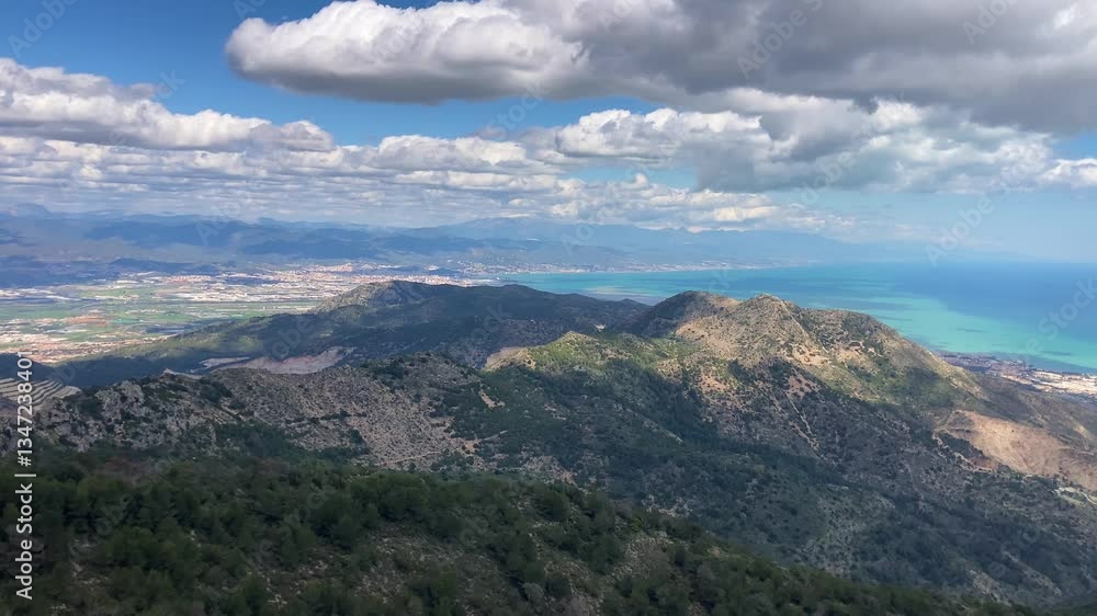 Panoramic view unfolds from the scenic hiking path leading to Mijas peak, showcasing the stunning landscapes of Andalusia, Malaga, Spain Panoramic view unfolds from the scenic hiking path leading to Mijas peak, showcasing the stunning landscapes of Andalusia, Malaga, Spain