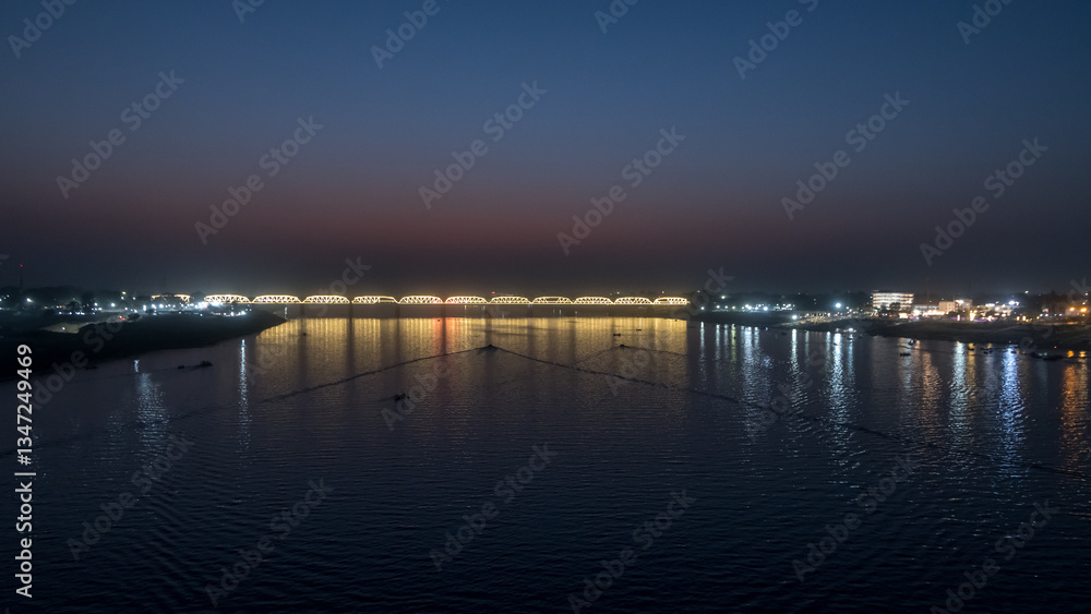 Aerial view tent city at The Maha Kumbh Mela in Prayagraj, Uttar Pradesh at the Triveni Sangam in Prayagraj, Uttar Pradesh, India. The Mahakumbh Mela is a Hindu festival that happens every 12 years. Aerial view tent city at The Maha Kumbh Mela in Prayagraj, Uttar Pradesh at the Triveni Sangam in Prayagraj, Uttar Pradesh, India. The Mahakumbh Mela is a Hindu festival that happens every 12 years.