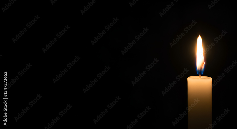 Serene White Candle with Bright Flame in Complete Darkness Serene White Candle with Bright Flame in Complete Darkness