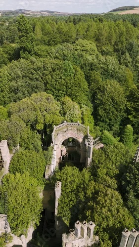 Aerial drone footage captures the haunting ruins of Crawford Priory, hidden in the Scottish countryside.Abandoned Gothic castle evokes mystery, decay, and a chilling, ghostly atmosphere lost in time