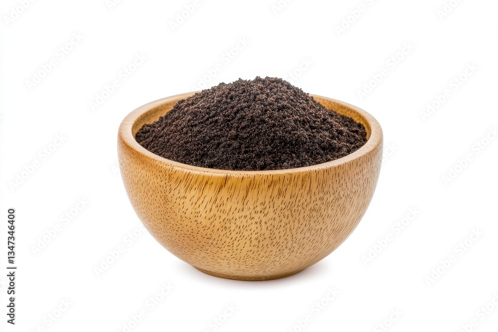 Dark Brown Seeds in a Wooden Bowl on White Background Dark Brown Seeds in a Wooden Bowl on White Background