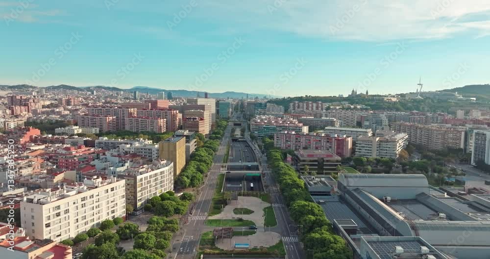 Aerial view of the cityscape of the streets of Barcelona. Traffic and movement of cars on the avenues, architecture of the urban landscape in Catalonia, Spain. High quality 4k footage Aerial view of the cityscape of the streets of Barcelona. Traffic and movement of cars on the avenues, architecture of the urban landscape in Catalonia, Spain. High quality 4k footage