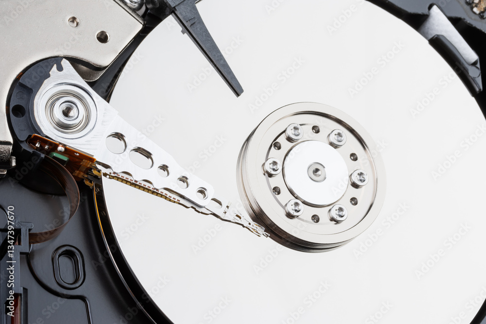 Close-up of the mechanism of a disassembled computer hard disk