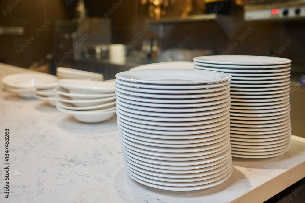 Beautifully Stacked Plates Arranged in a Contemporary Modern Kitchen Environment Setting Beautifully Stacked Plates Arranged in a Contemporary Modern Kitchen Environment Setting