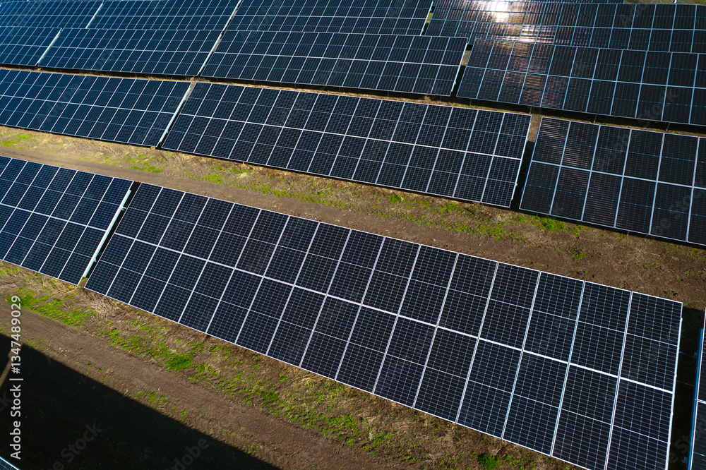 Green energy reduce carbon emissions and makes earth cleaner and more ecological.Solar panels park generating green energy electric. Green energy reduce carbon emissions and makes earth cleaner and more ecological.Solar panels park generating green energy electric.
