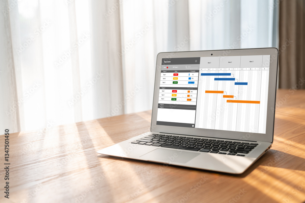 Project planning software for modish business project management on the computer screen showing timeline chart of the team project Project planning software for modish business project management on the computer screen showing timeline chart of the team project