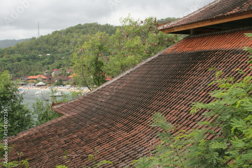 Balinese roof and Padangbai in the background.