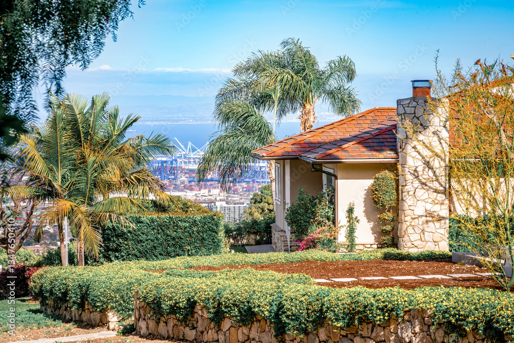Neighborhoods with small roads and homes overlooking Los Angeles and the Port of Los Angeles during a bright, beautiful clear Springtime day