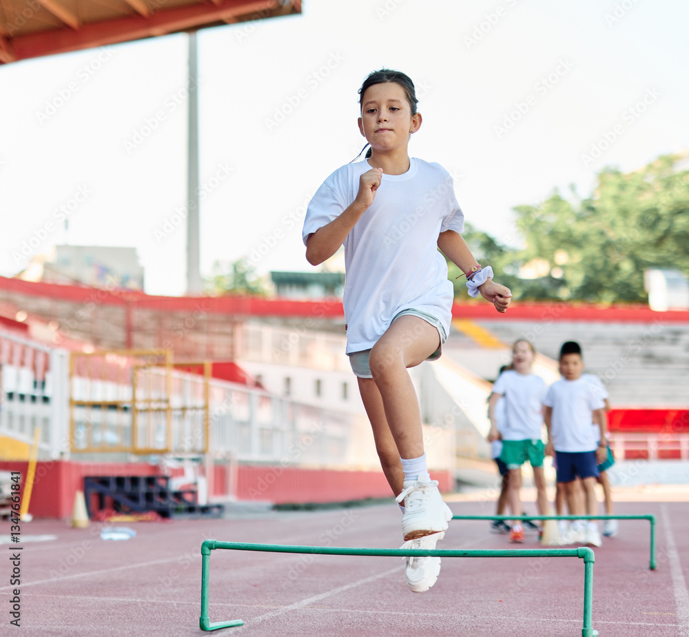 Naklejka premium child sport athlete childhood girl competition fun young outdoor active exercise kid running fitness training athletic game healthy group play team school exercising