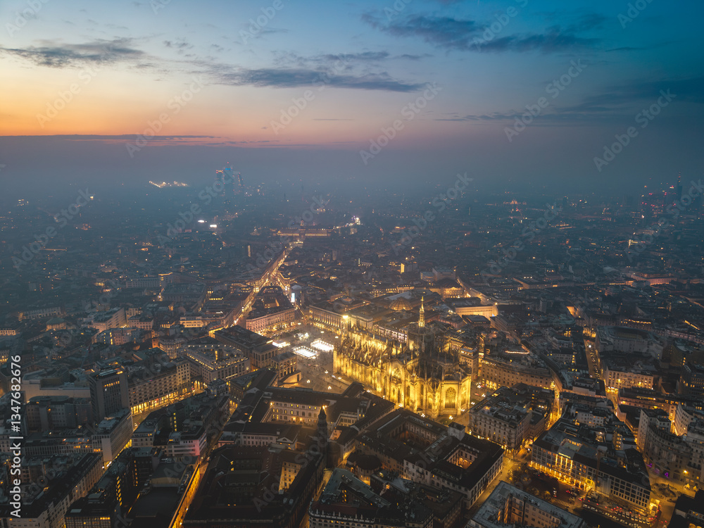 Obraz premium Night aerial drone view of illuminated Milano Duomo, Italy, lights