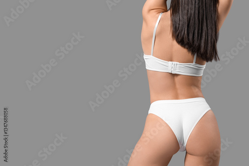 Young woman in white underw...