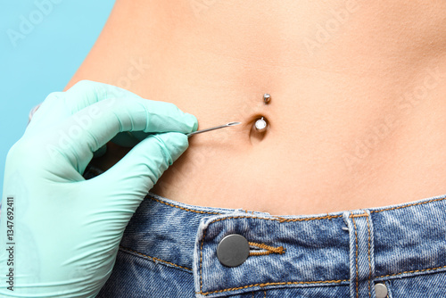 Professional doing piercing...