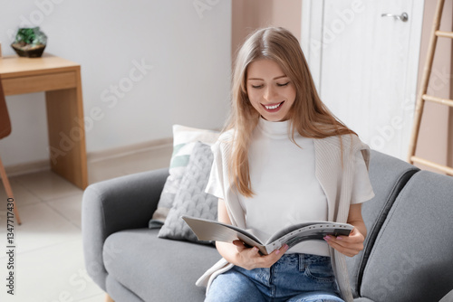 Young pretty woman reading ...