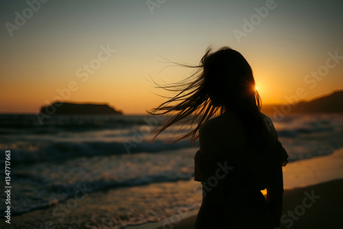 Silhouette of a woman standing on the beach at sunset with the sun reflecting on the ocean, capturing the beauty and freedom of a summer evening