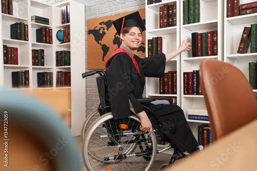 Male graduate in wheelchair...