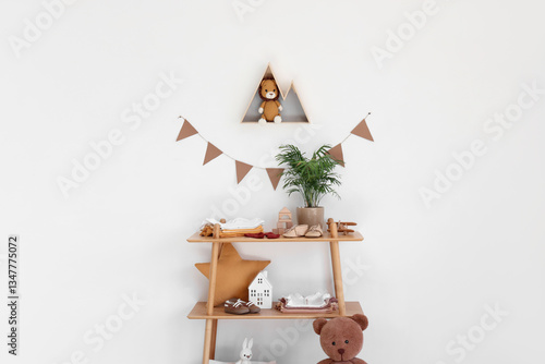 Shelf unit with baby clothe...