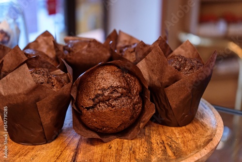 Freshly Baked Chocolate Muffins on Wooden Tray