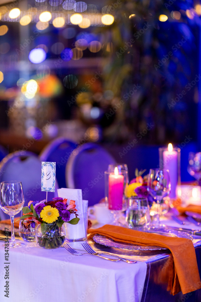 Festive table decoration with candles and floral centerpiece