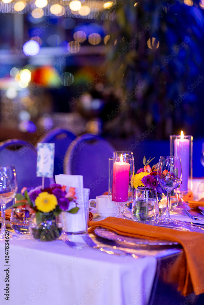 Festive table decoration with candles and floral centerpiece