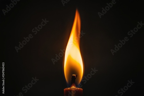 A close up image of a burning candle flame