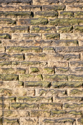grimy rough pitched face stone wall