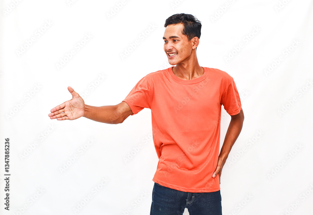 Smiling Person in Orange Shirt Offering Handshake Against White Background Smiling Person in Orange Shirt Offering Handshake Against White Background