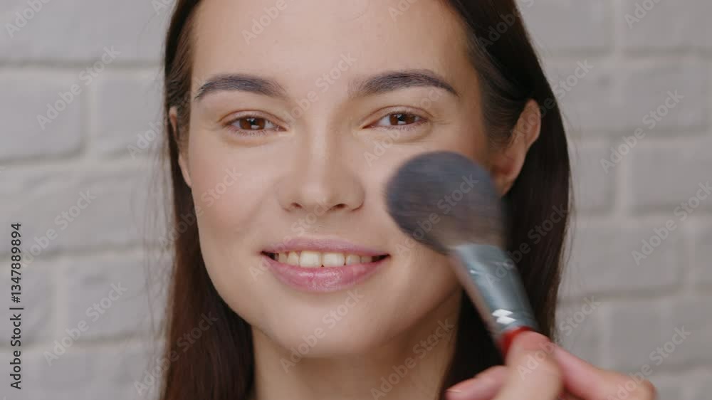 A Woman Expertly Applying Makeup with a Brush to Achieve a Fresh and Radiant Look A Woman Expertly Applying Makeup with a Brush to Achieve a Fresh and Radiant Look