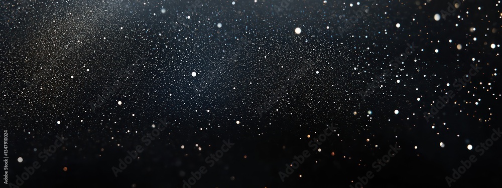 Fototapeta premium Subtle glitter gradient adorns a black background with minimal festive sparkles.