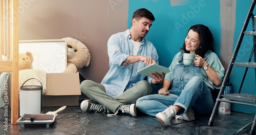 Obraz na płótnie Home, renovation and couple with tablet, baby room and ecommerce choices with planning for decoration. Support, man and pregnant woman on floor, tech and digital layout with DIY, relax or internet w salonie