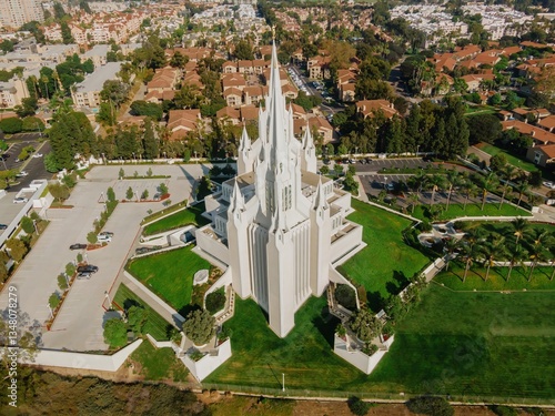 The San Diego California Temple, a house of worship for The Church of Jesus Christ of Latter-day Saints, stands above a busy highway in San Diego, California, USA.