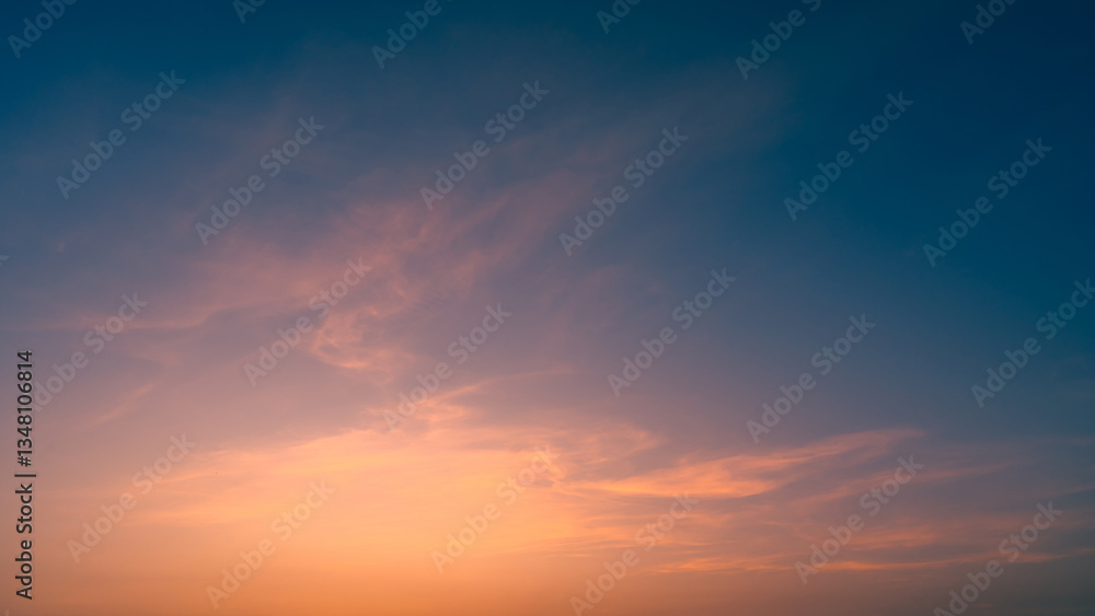 Dusk,Sunset sky twilight in the evening with Orange, pink and purple colorful sunlight majestic Summer sky Backgrounds. Dusk,Sunset sky twilight in the evening with Orange, pink and purple colorful sunlight majestic Summer sky Backgrounds.