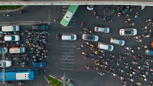 Photos Extreme close up bird Top View of Chaotic Traffic at a Bustling Intersection in