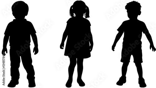 Silhouettes of Three Young Children Standing