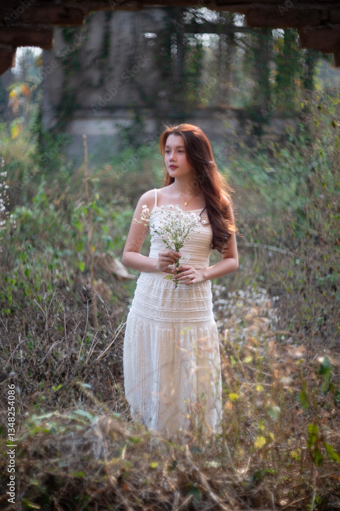 Relax concepts, Beautiful teenage girl on a bright day in nature flowers garden