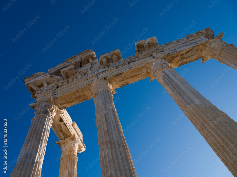 Stunning view of the ruins of the Temple of Apollo in Side. Archaeological heritage of Turkey. Mediterranean coast Manavgat district, Antalya city Stunning view of the ruins of the Temple of Apollo in Side. Archaeological heritage of Turkey. Mediterranean coast Manavgat district, Antalya city
