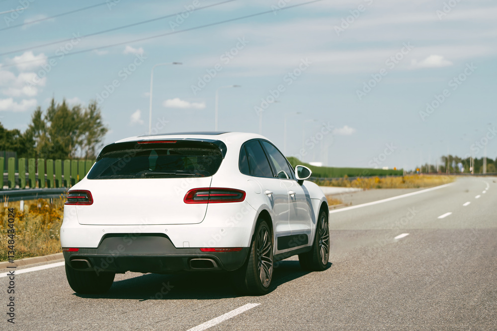 High-performance SUV cruising on a clear highway. High-performance SUV cruising on a clear highway.