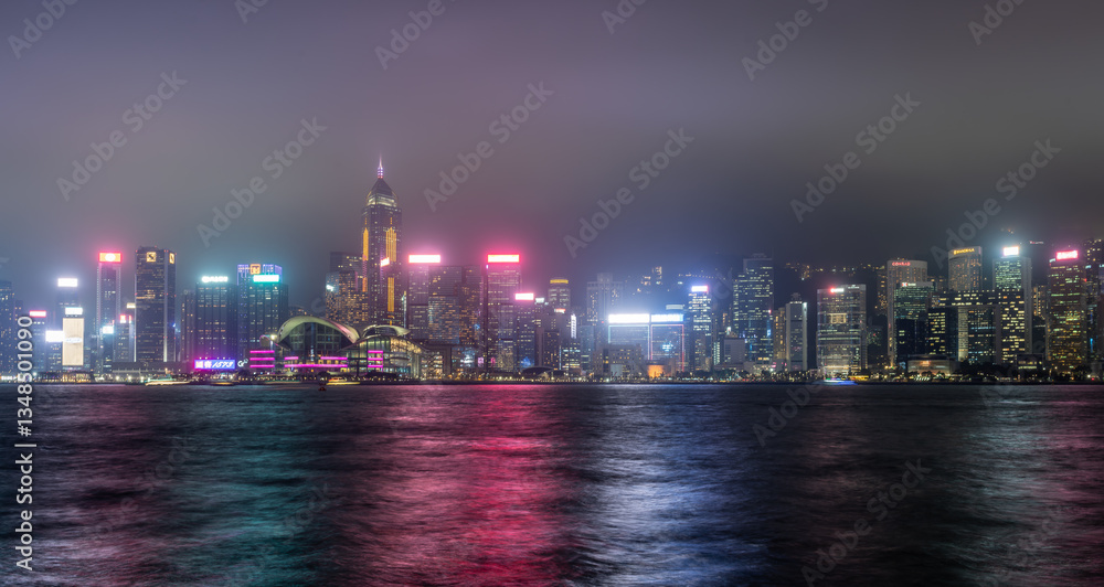 Fototapeta premium A long exposure night view of Hong Kong island Wan Chai district city skyline.