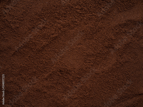 Grounded coffee beans top view background texture