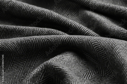 Wallpaper Mural A soft herringbone wool fabric texture background in charcoal gray. The subtle zigzag weave adds a sophisticated and classic touch, ideal for tailored coats, winter suits, and refined interior decor. Torontodigital.ca