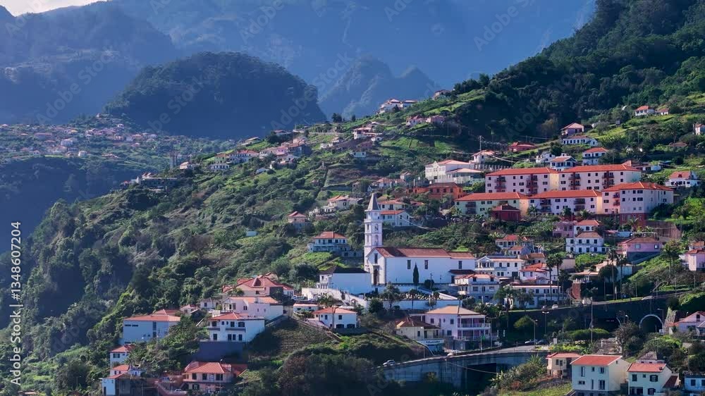 Aerial View of Faial Village, Encompassed by Cloud Covered Mountain Peaks, Madeira Island, Portugal Aerial View of Faial Village, Encompassed by Cloud Covered Mountain Peaks, Madeira Island, Portugal