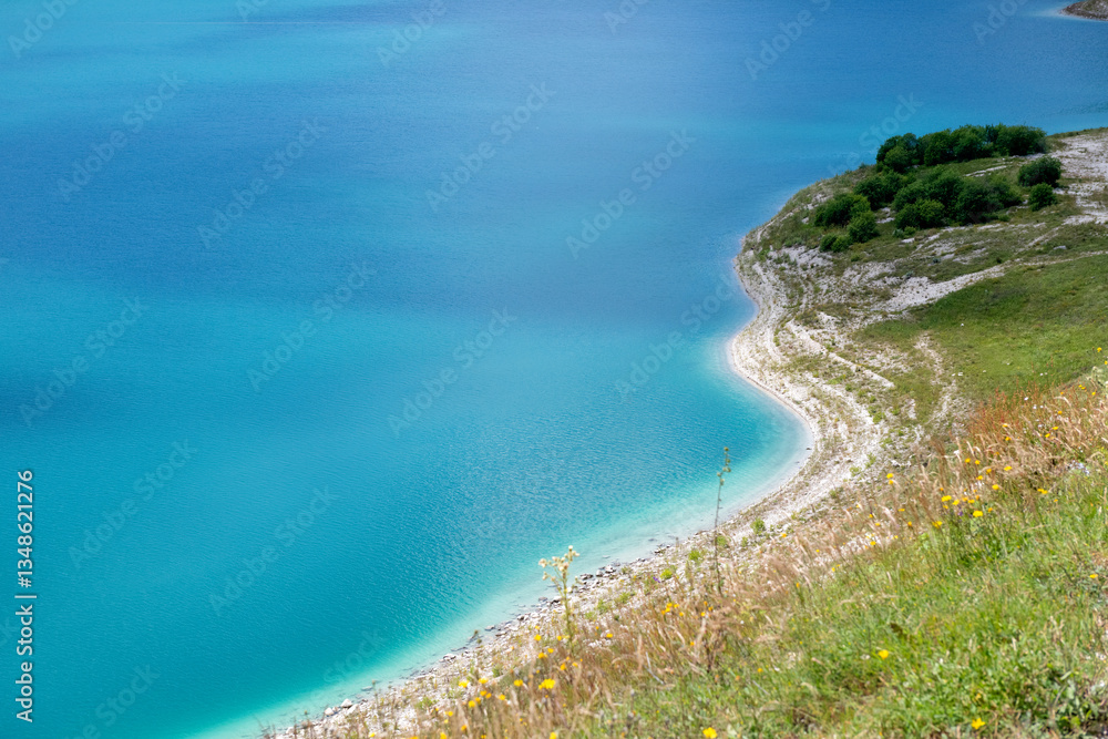 The high-altitude lake Kezenoy—Am is the largest lake in the North Caucasus, located on the border of the Cheberloevsky district of the Chechen Republic and the Botlikhsky district of Dagestan, Russia The high-altitude lake Kezenoy—Am is the largest lake in the North Caucasus, located on the border of the Cheberloevsky district of the Chechen Republic and the Botlikhsky district of Dagestan, Russia