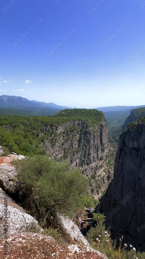 The landscape of a mountain valley with forests and cliffs. Huge rocks and rocky ledges. A beautiful popular canyon, where there are always a lot of tourists. Bird's-eye view of Tazi Canyon. The landscape of a mountain valley with forests and cliffs. Huge rocks and rocky ledges. A beautiful popular canyon, where there are always a lot of tourists. Bird's-eye view of Tazi Canyon.