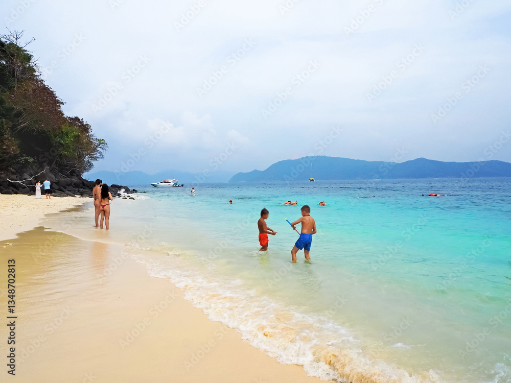 Vacation at Pattaya beach, enjoying the warm sun and clear turquoise water Vacation at Pattaya beach, enjoying the warm sun and clear turquoise water