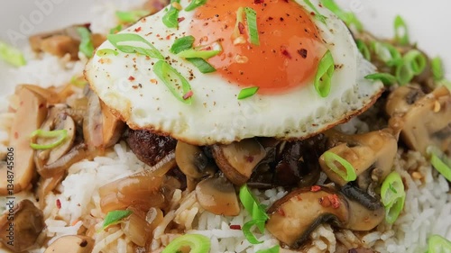 Hawaiian Loco Moco with hamburger, fried egg and brown mushroom gravy