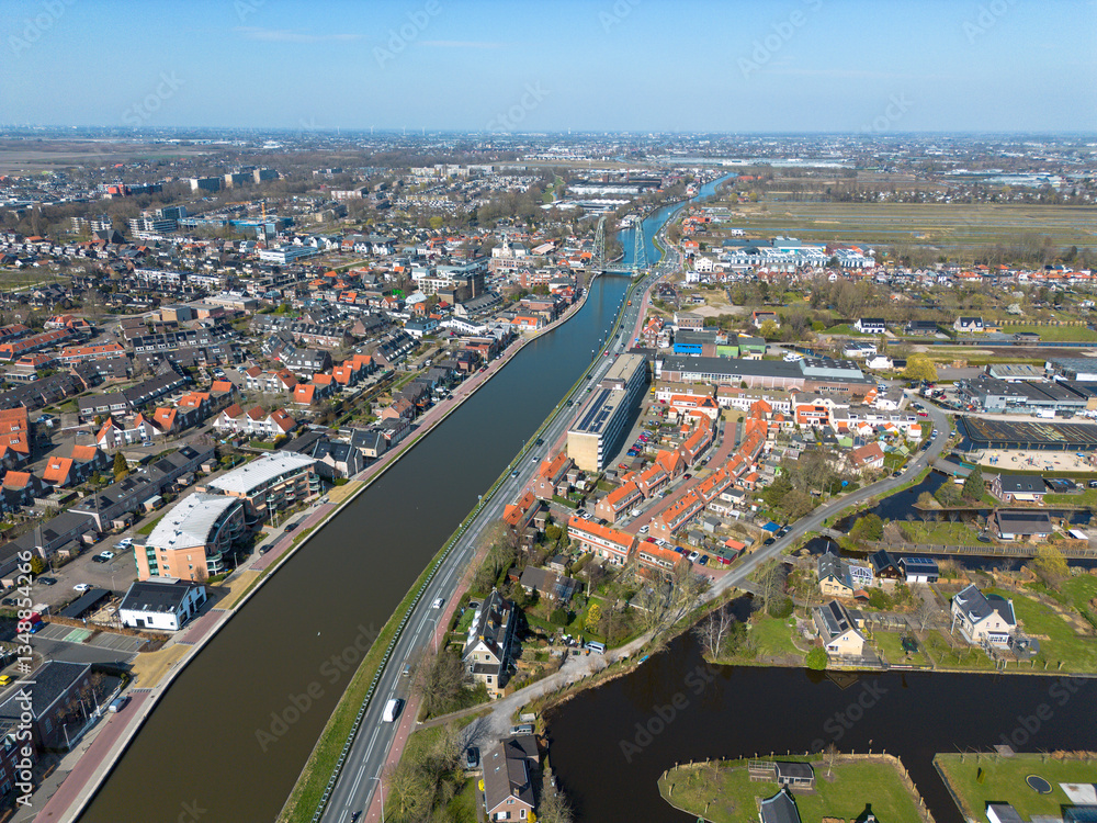 Fototapeta premium Steel vertical lift bridge over the Gouwe canal in Waddinxveen