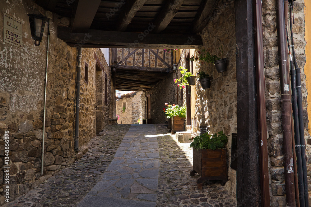 Beautiful houses and streets of the town of Potes in the peaks of Europe, belonging to the autonomous community of Cantabria. It is located in the center of the region of Liébana. Beautiful houses and streets of the town of Potes in the peaks of Europe, belonging to the autonomous community of Cantabria. It is located in the center of the region of Liébana.